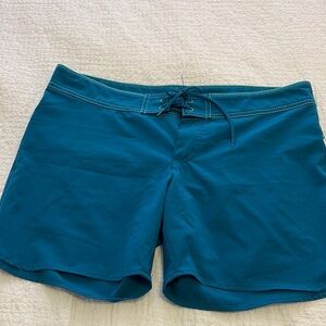 Carve women’s teal board shorts.  Size 8